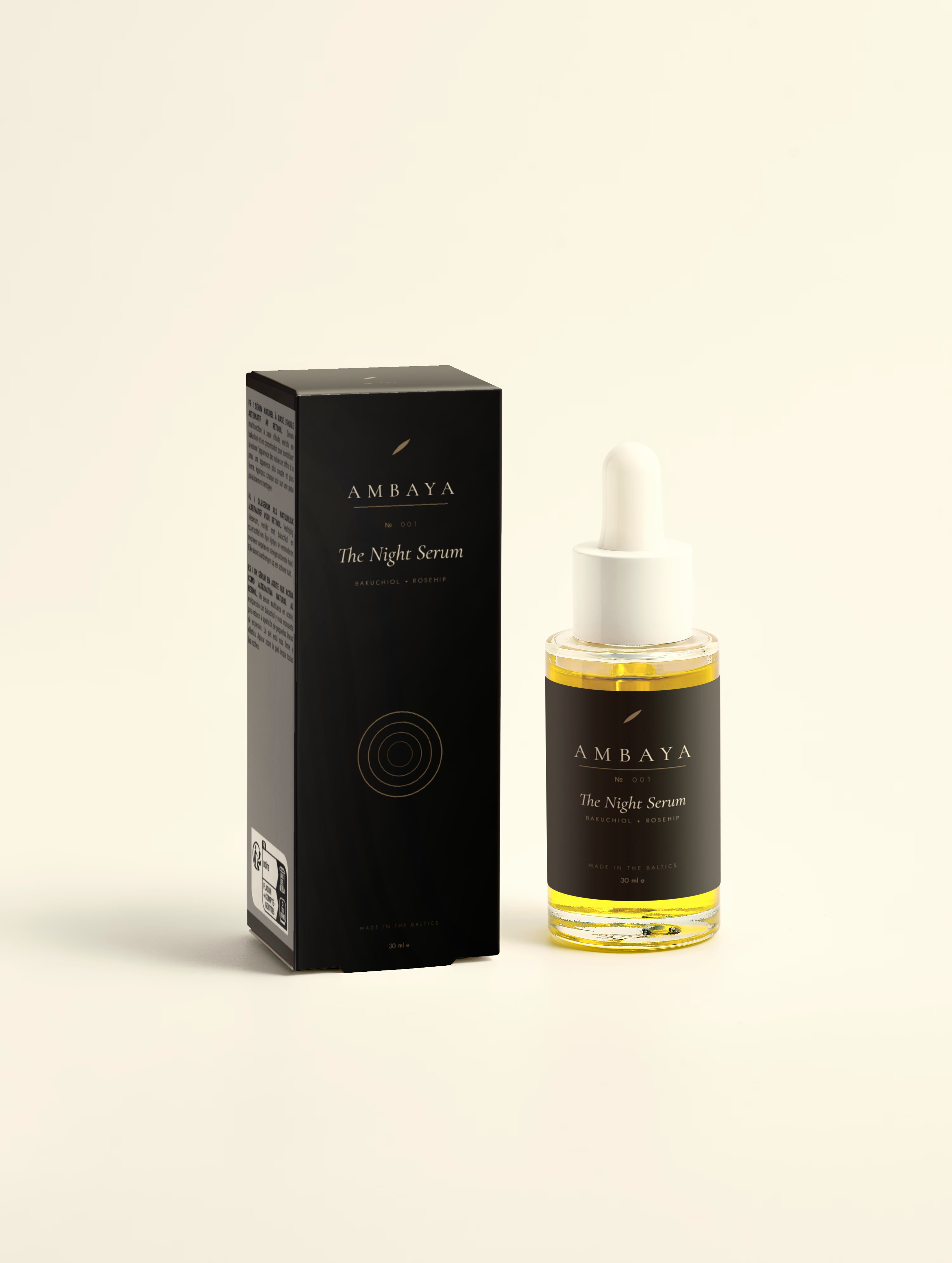Black carton and amber dropper bottle of The Night Serum, 30 ml, with the gold AMBAYA wordmark and leaf mark, on a pale cream background.