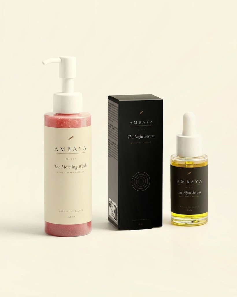 The Morning Wash pump bottle, the Night Serum carton and the Night Serum dropper bottle on a cream background.